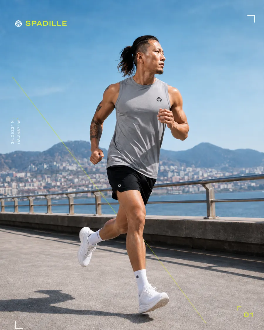 Spadille campaign: a runner on a waterfront promenade in performance kit